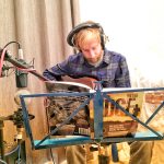 James Porter recording Lady Will You Be My Friend on guitar